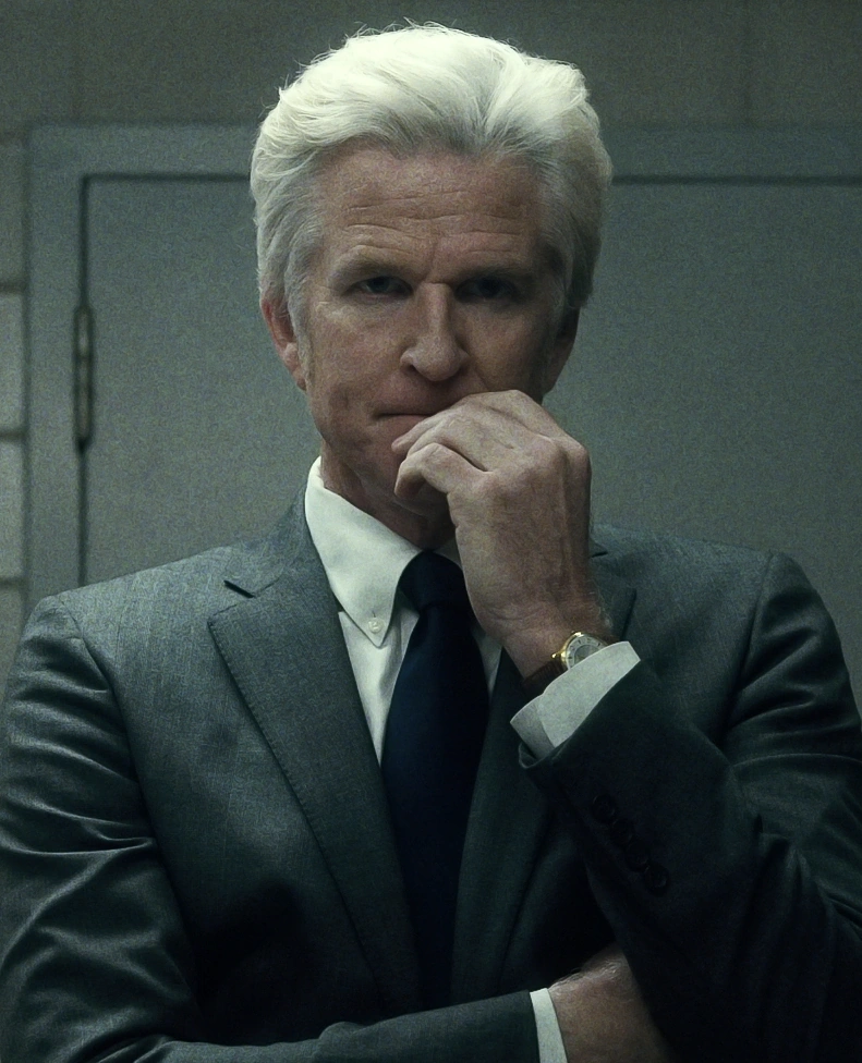 Matthew Modine as Papa, or Dr. Brenner, staring straight into the camera.